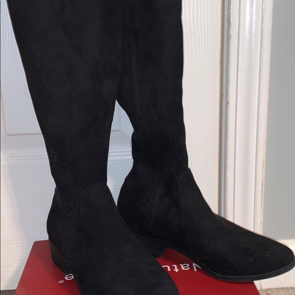 Tall black boots